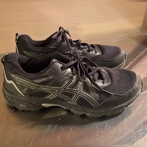 Women’s black ASICS size 8.